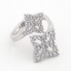 Незамкнутий срібний перстень з фіанітами з квітами на кінцях K11891, 17,5 розмір